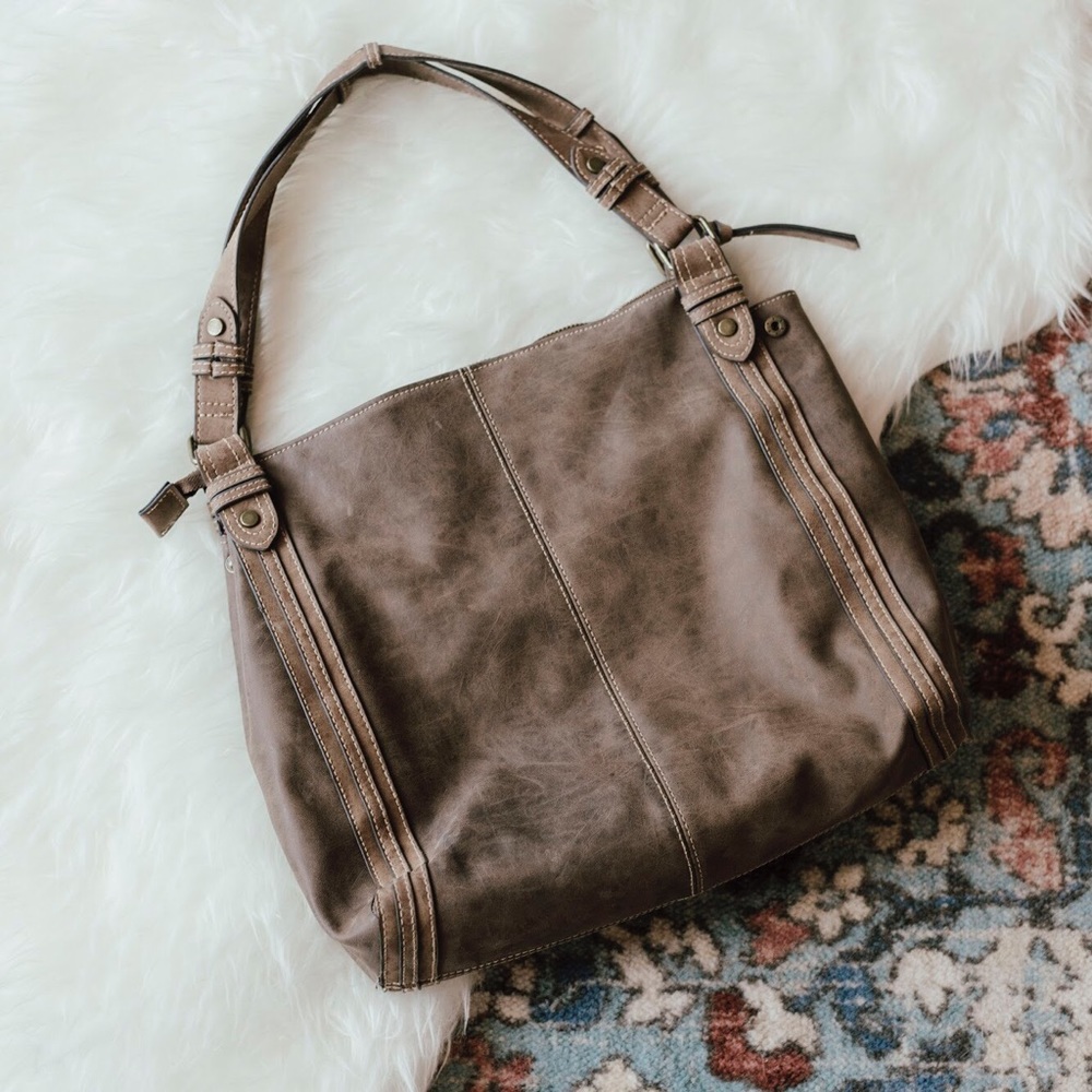 distressed brown hobo bag
